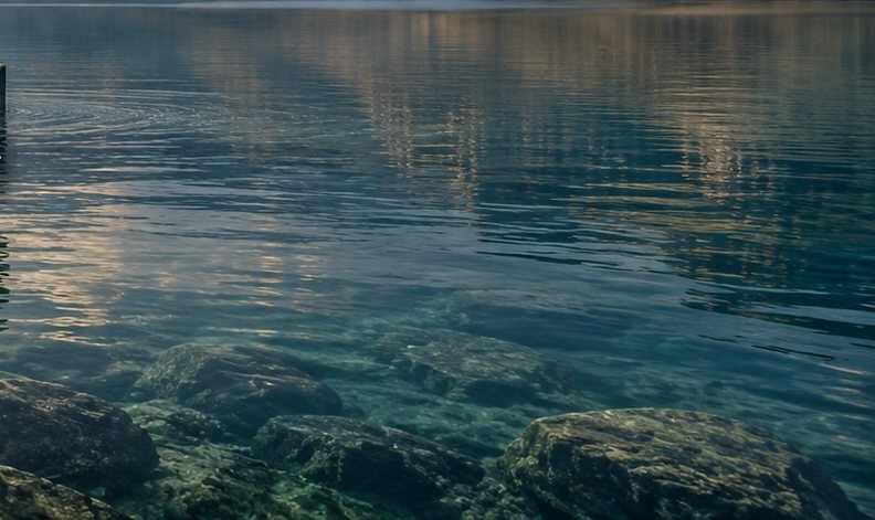 Clear water over smooth stones
