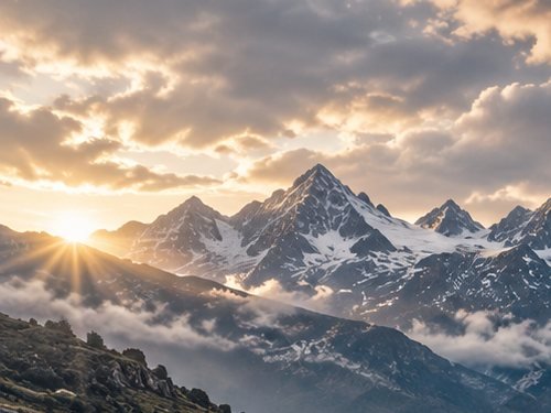 Sunrise over snow-capped mountains
